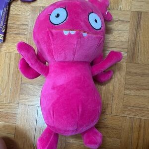 Vibrant Pink Stuffed Monster Toy